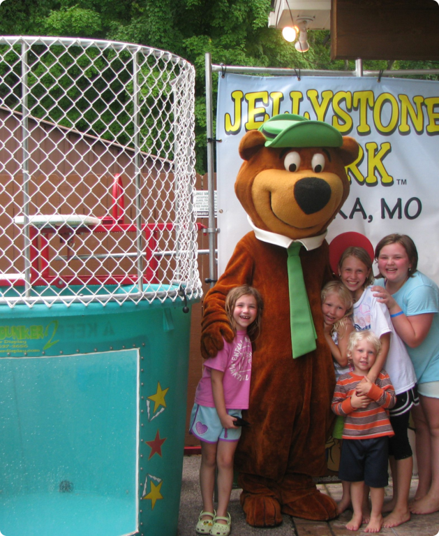 children and a brown bear
