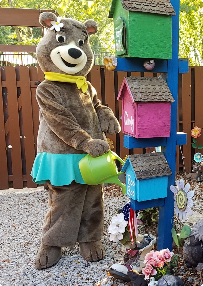 A bear wearing a mail carrier