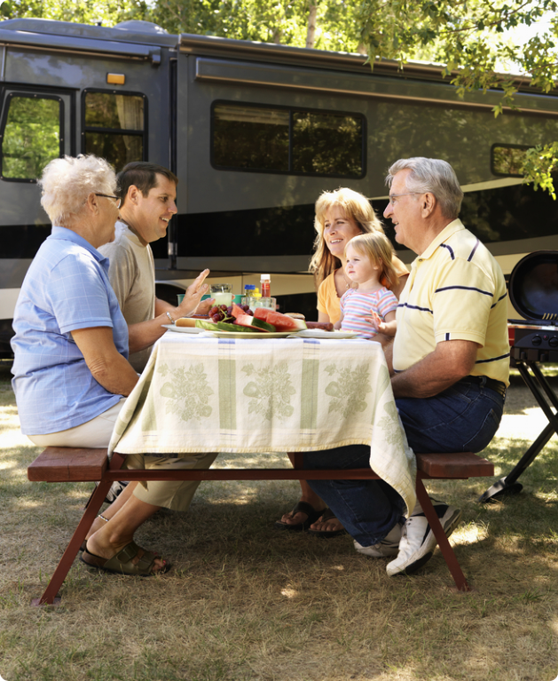 A group of children joyfully eating cake at a celebration